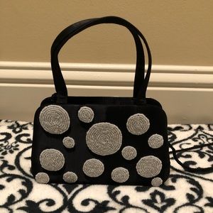 NWOT black and white beaded bag.